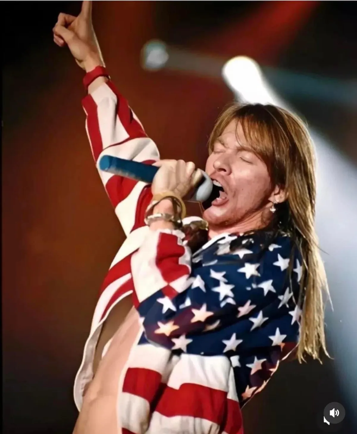 Performer in Kaptain jacket on stage